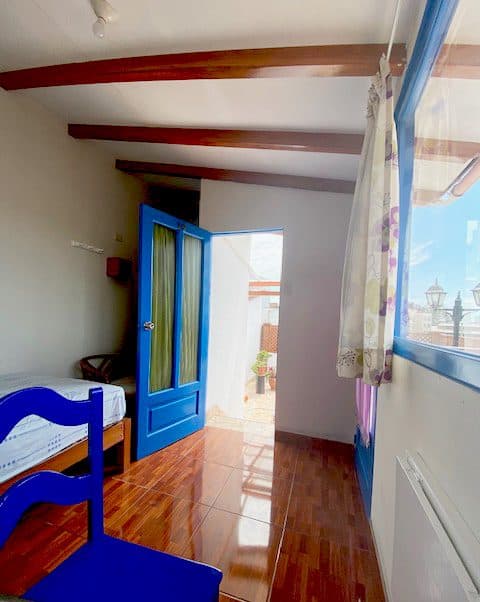 Bright single room with terrace access at Casa Yllika student housing Lima Peru